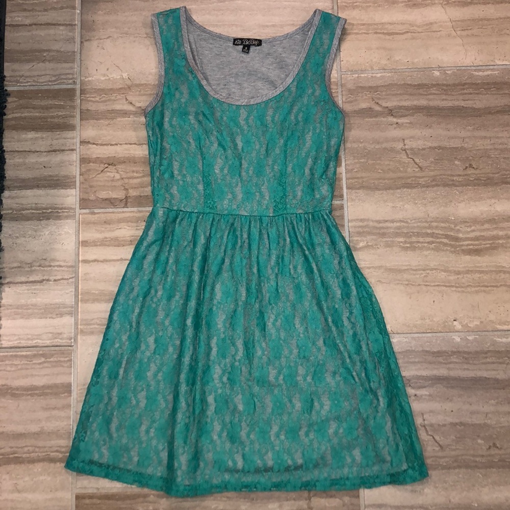 Teal lace covered grey dress